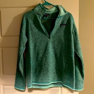 Turquoise Patagonia pullover jacket